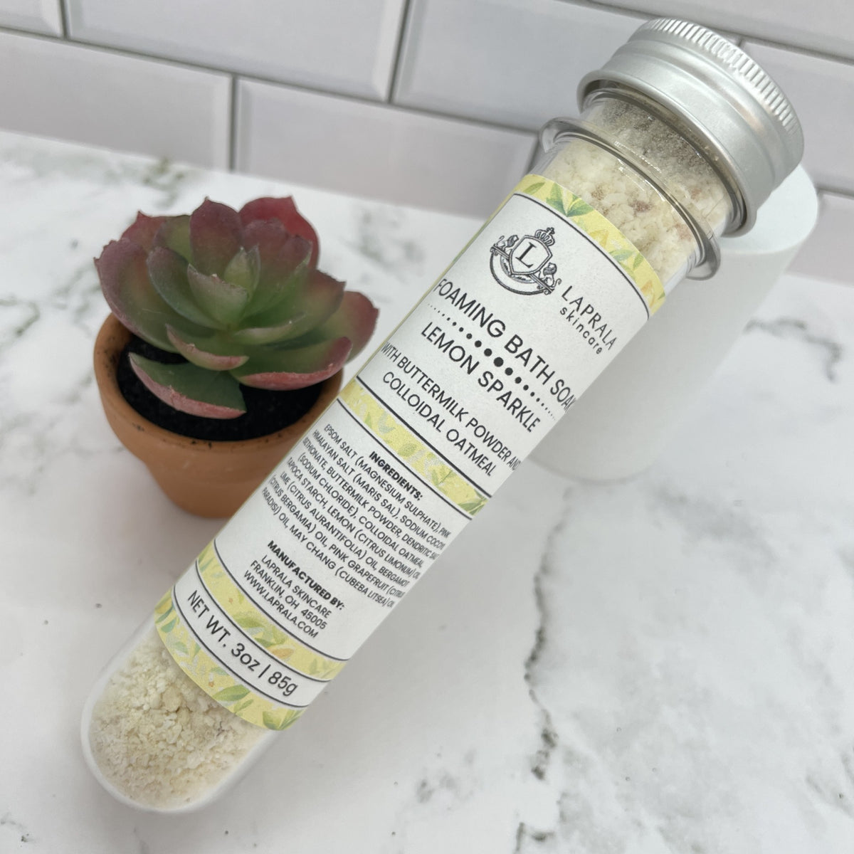 a single use tube of foaming bath soak that has the essential oils of lemon and lime.