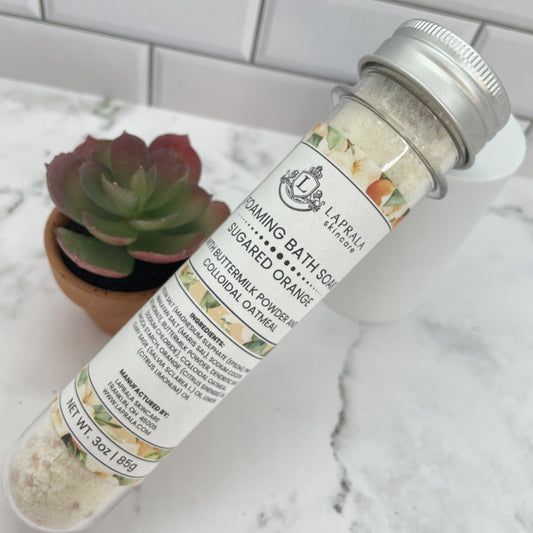 a foaming bath soak with buttermilk powder that is single use.  The scent is orange and other citrus essential oils.